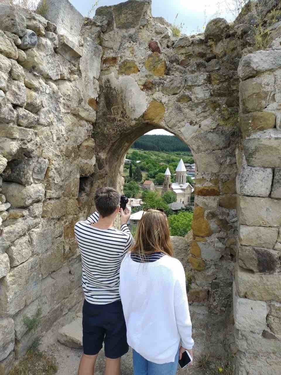 tourists in Georgia near Surami fortress