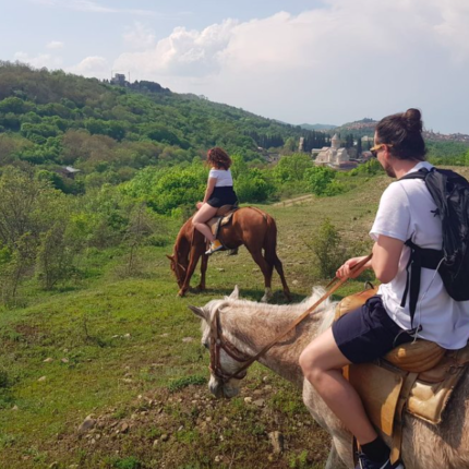 tourists on horses in Georgia